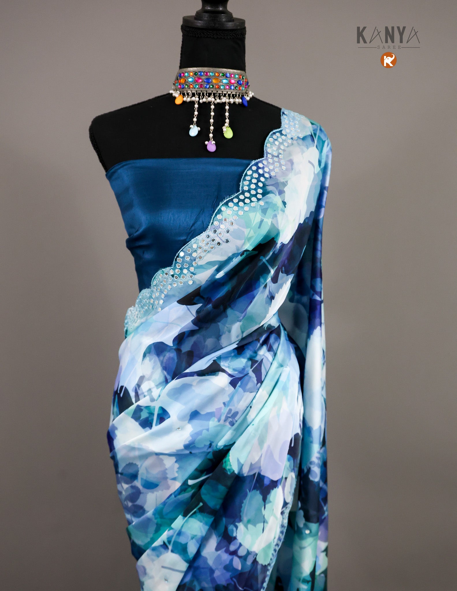 Blue Satin Printed saree with Mirror work on Border